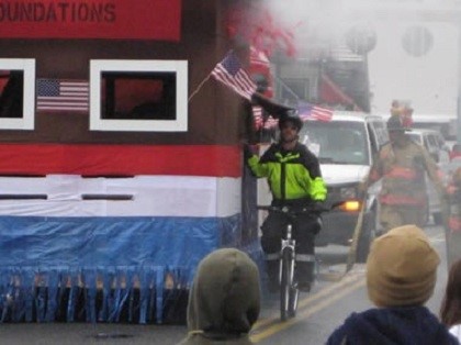 Fireman Biking in Parade